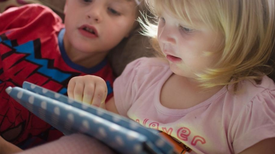 children playing on a tablet