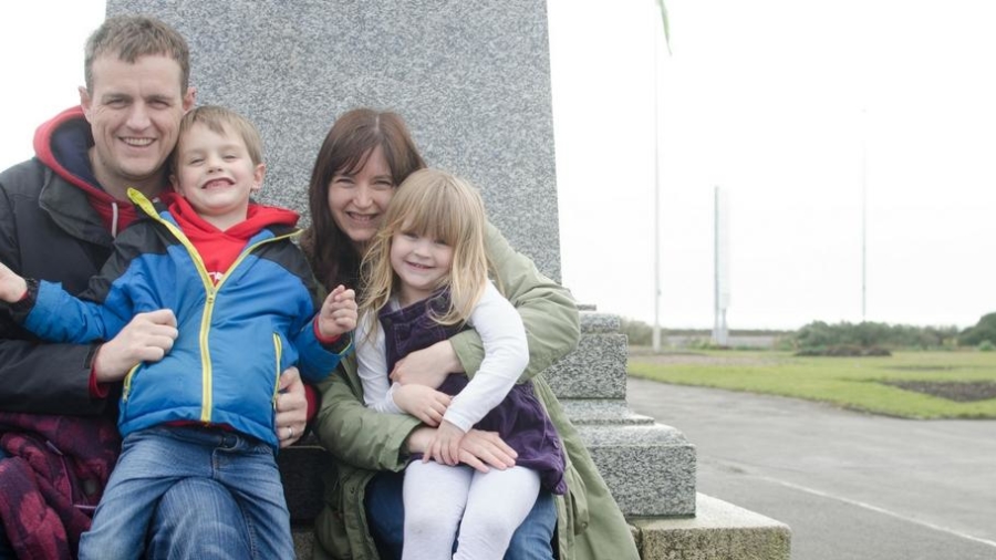 me and mine family sitting together in park
