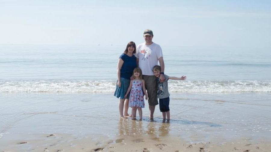 Family of four on Swansea bay