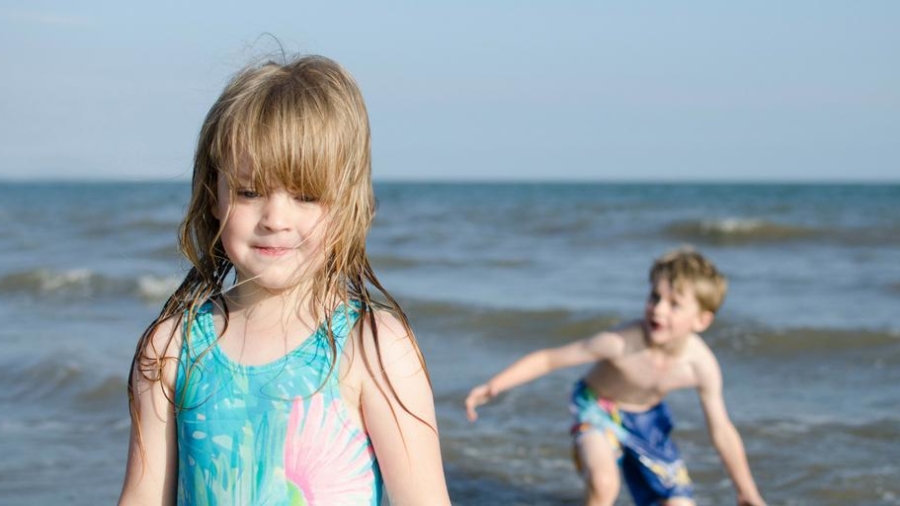 Children playing in the sea