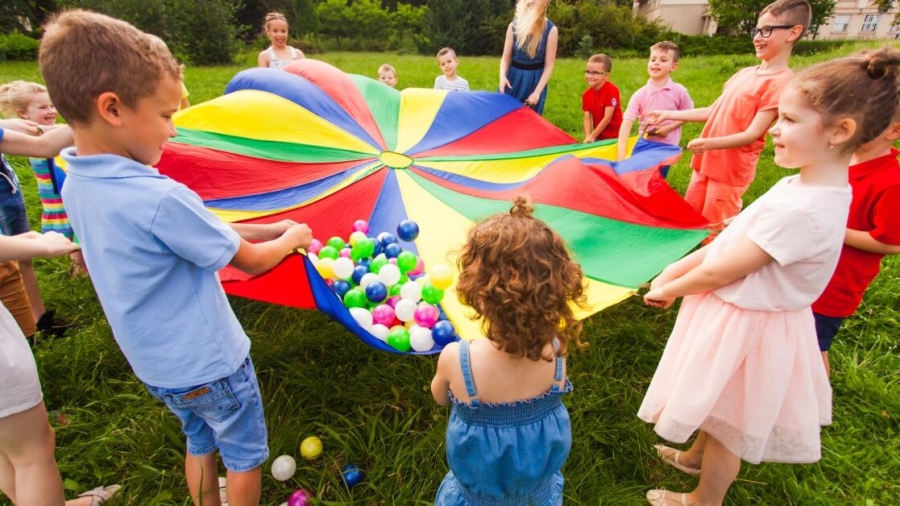 How can school holiday camps benefit my child